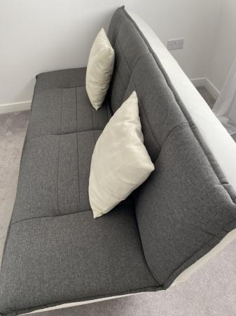 Image 2 of Charcoal grey material sofabed with chrome legs