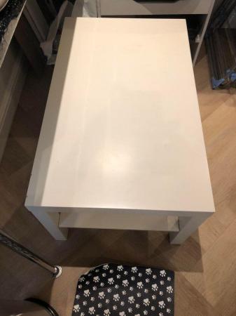 Image 1 of White coffee table with shelf used