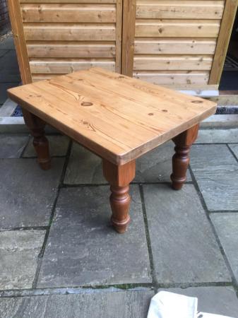 Image 1 of A very sturdy low pine table with turned legs.