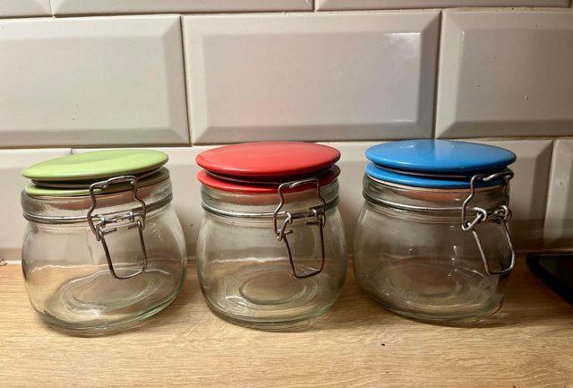 Image 2 of GLASS STORAGE JARS WITH COLOURED TOPS