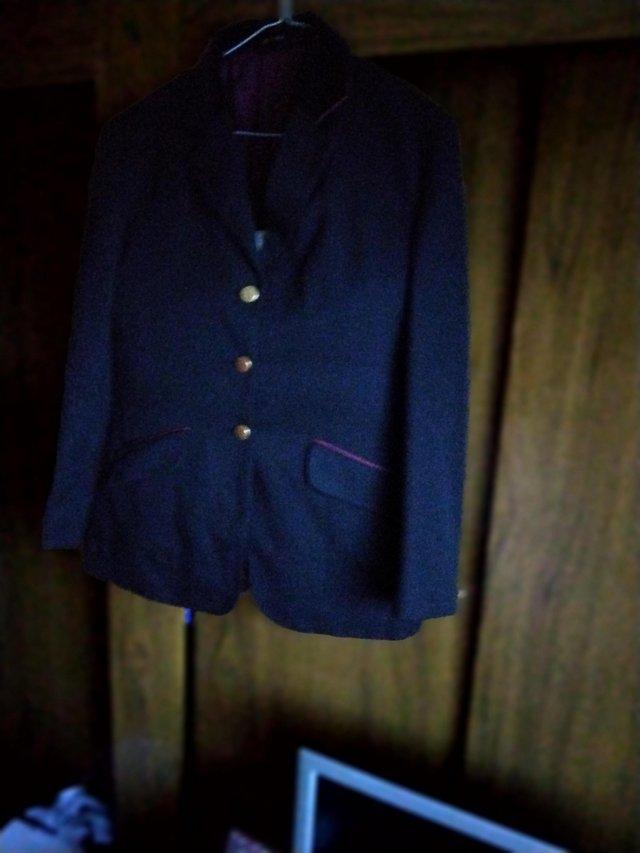 Preview of the first image of Navy show jacket never worn with tags ideal Xmas gift.
