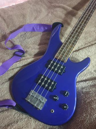 Image 1 of Bass Guitar, Wesley, with New padded case. Tuner. New stand