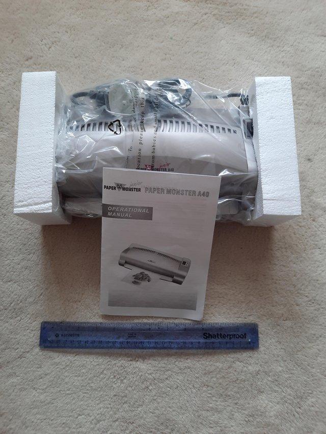Preview of the first image of Laminating Machine and Pouches - Never Used.