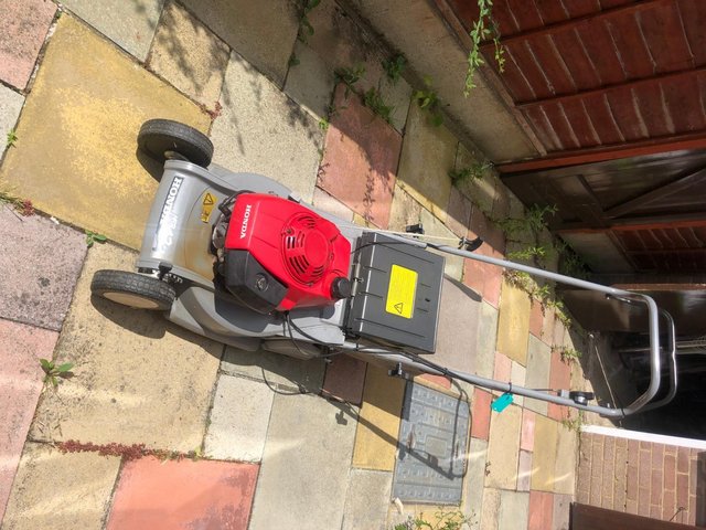 Preview of the first image of Honda motor mower, very good condition..