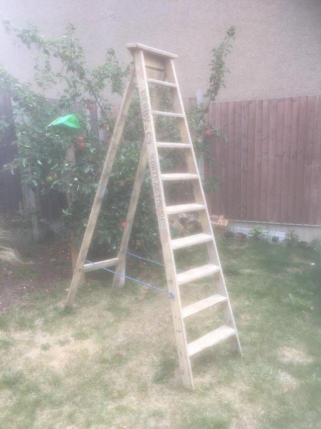 Preview of the first image of VINTAGE WOODEN DECORATOR'S STEP LADDER.