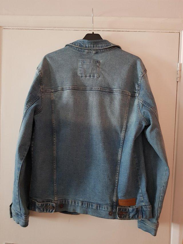 Preview of the first image of Blue Denim Jacket - Pull & Bear.