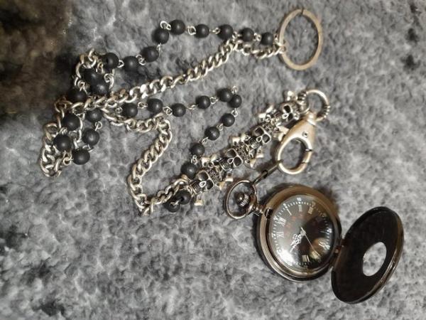 Image 3 of black pocket watch with goth type chain.