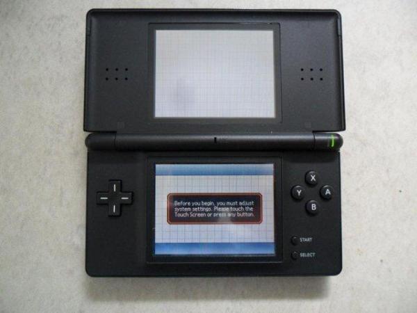 Image 2 of Nintendo DS with Brain Training and two  Crossword Colection