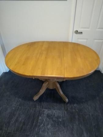 Image 1 of Solid wood extending Dining Table and 4 Chairs. BARGAIN