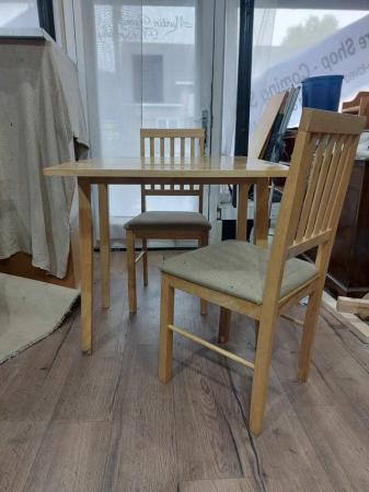 Image 1 of Small drop leaf table with two chairs