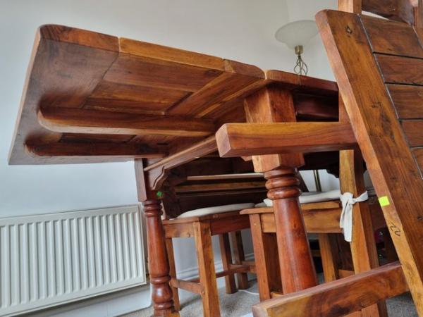 Image 3 of Solid wooden extendable dining table and 6 chairs