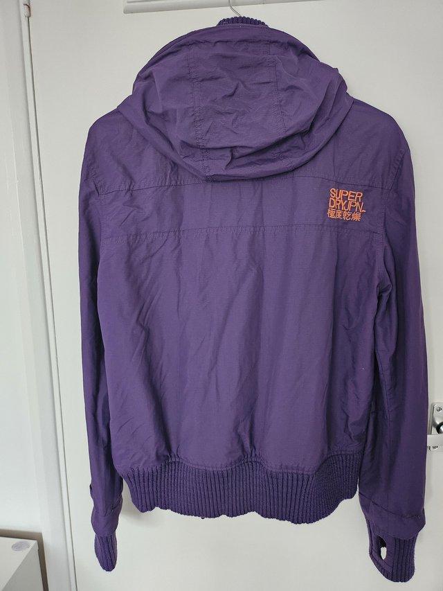 Preview of the first image of SuperDry purple Coat size -XL.