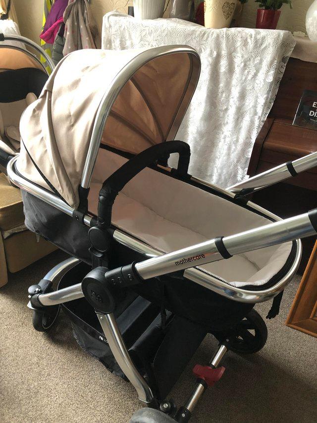 Preview of the first image of Combination pushchair incl car seat and rain covers.
