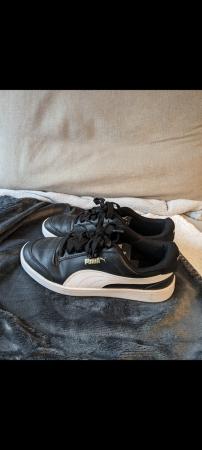 Image 1 of Puma black trainers size 5
