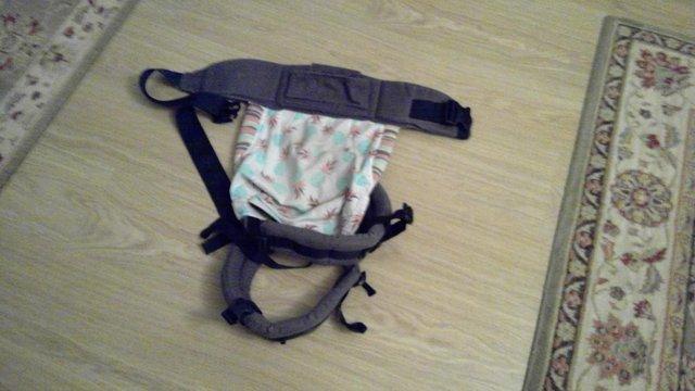Preview of the first image of Tula Free to grow baby carrier.