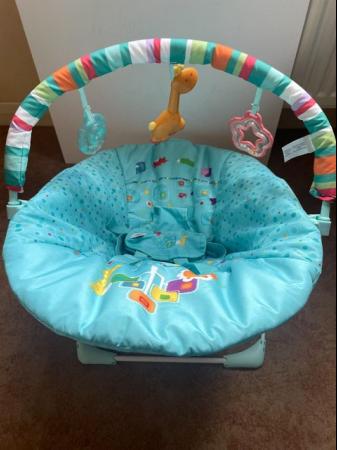 Image 4 of Bright Starts vibrating Baby Bouncer/chair. new cover