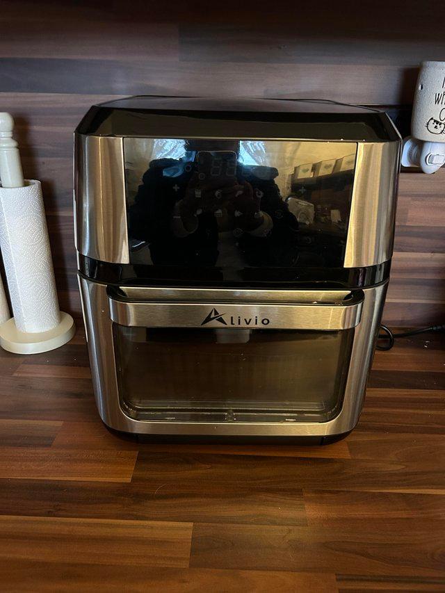 Preview of the first image of Air fryer with rotisserie and accessories.