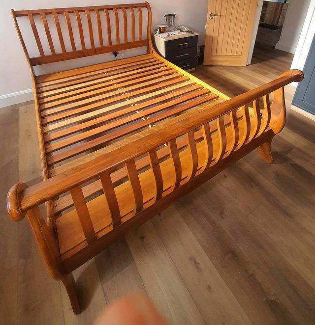 Preview of the first image of WILLIS AND GAMBIER KINGSIZE HARDWOOD AND SLATTED BED FRAME -.