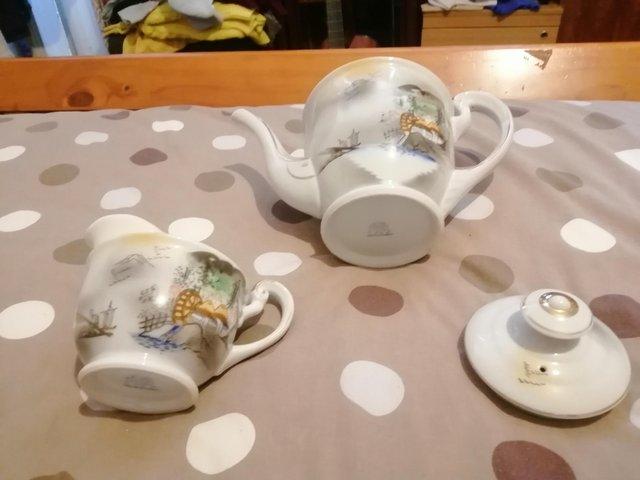 Preview of the first image of Lithophane Giesha 20 piece Porcelain tea set..