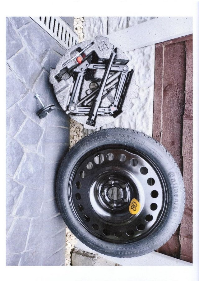 Preview of the first image of space saver spare wheel genuine part.