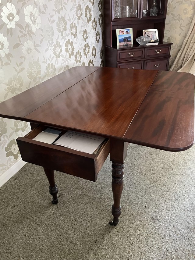 Preview of the first image of Antique mahogany dining table.