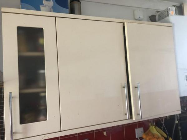 Image 1 of Kitchen. Cream white wall units glazed glass