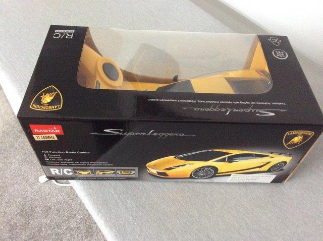 Preview of the first image of Yellow Super Leggera racing car.