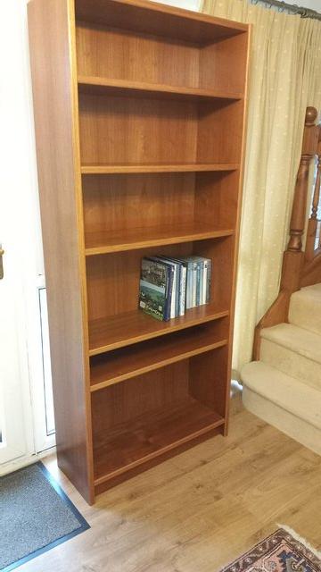 Preview of the first image of Teak veneer bookcase good condition.