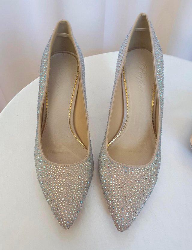 Preview of the first image of Classic nude crystal encrusted pointed court shoe. New..