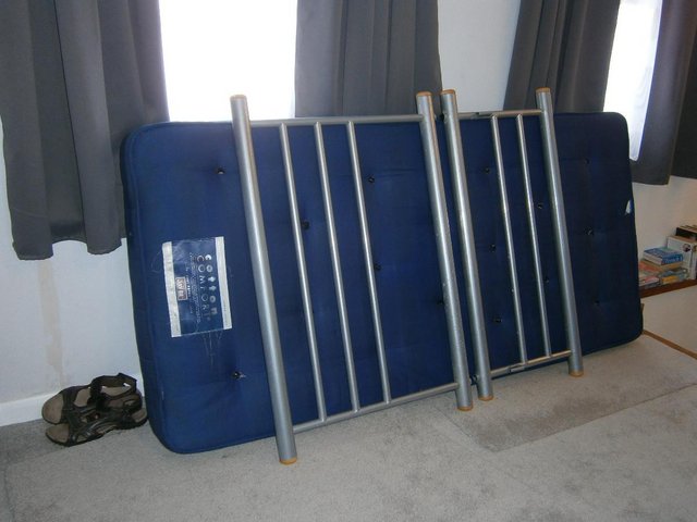 Preview of the first image of Single steel bed with mattress.