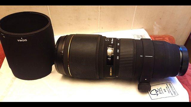 Preview of the first image of Sigma 100-300mm F4 APO DG Zoom Lens (A Mount).