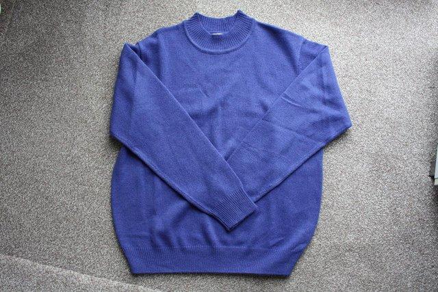 Preview of the first image of Women's Blue Damart Crew neck Jumper size 14/16.