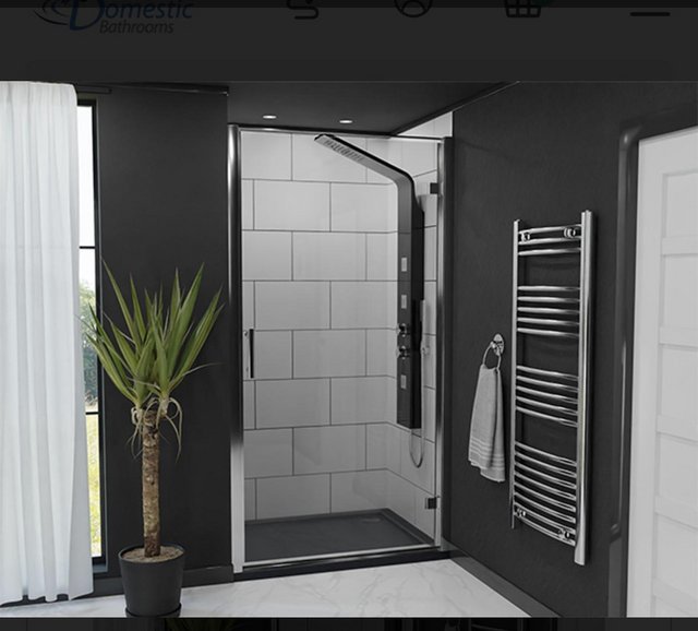 Preview of the first image of 1000mm chrome hinged shower door.