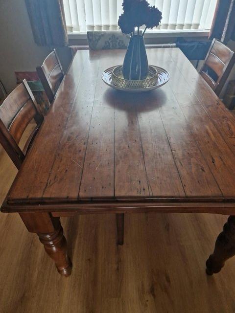 Preview of the first image of 6 chairLarge farmhouse solid wooden table and 4 woodenchairs.