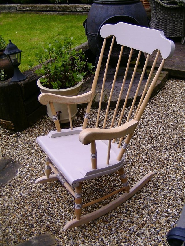 Preview of the first image of Wooden rocking chair in elm.