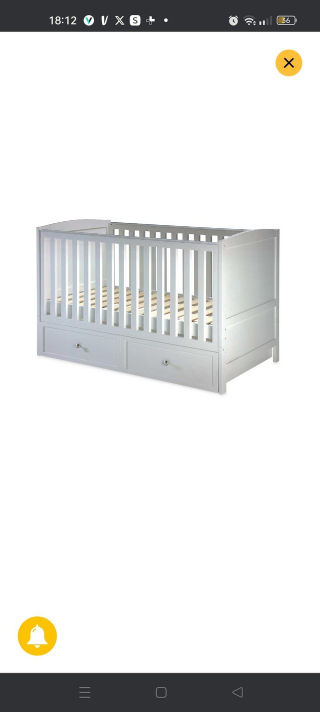 Preview of the first image of Cotbed/ toddler bed with mattress.