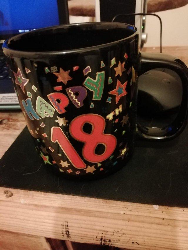 Preview of the first image of 18th Birthday mug black/multi coloured.