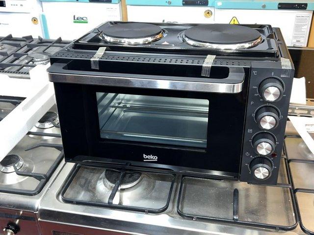 Preview of the first image of BEKO TABLETOP 30L MINI OVEN WITH HOTPLATES-NEW BLACK-FAB.