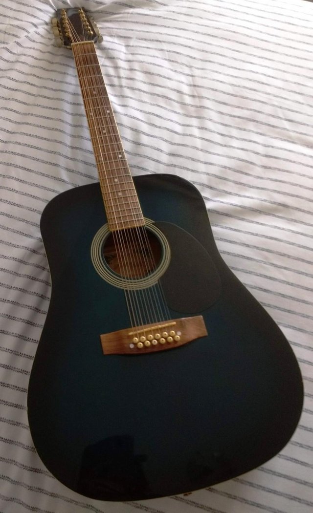 Preview of the first image of Starfire 12 string acoustic guitar - blue.