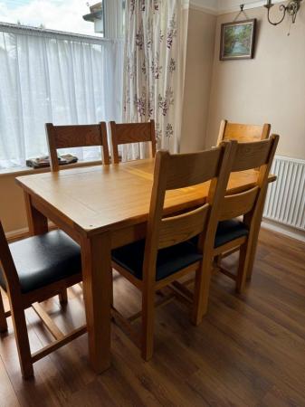 Image 1 of Dining table (extending) with 6 dining chairs