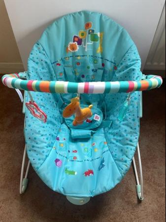 Image 1 of Bright Starts vibrating Baby Bouncer/chair. new cover