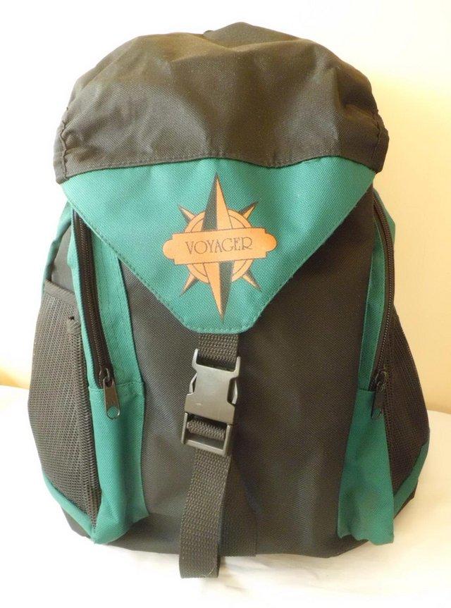 Preview of the first image of Voyager Black and Green Backpack - New.