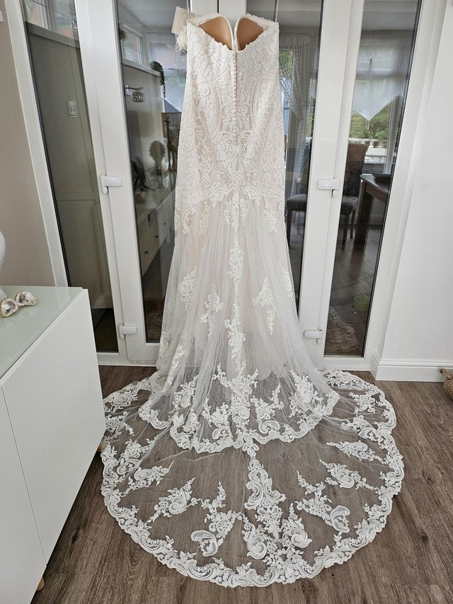 Preview of the first image of Maggie Sottero Ralston wedding dress.