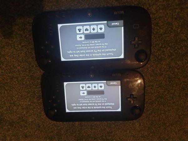 Image 2 of Wii u controllers in black used like new