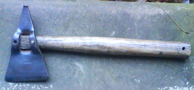 Image 2 of small triangular shaped axe, German 2nd ww.for display only.