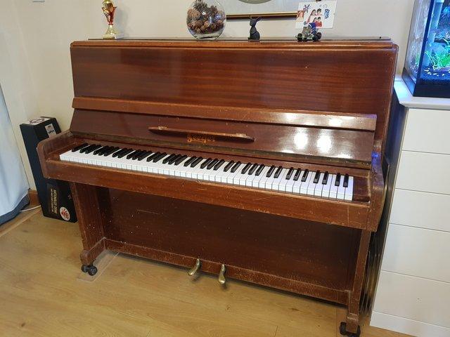 Preview of the first image of Seeger upright piano free to a good home.