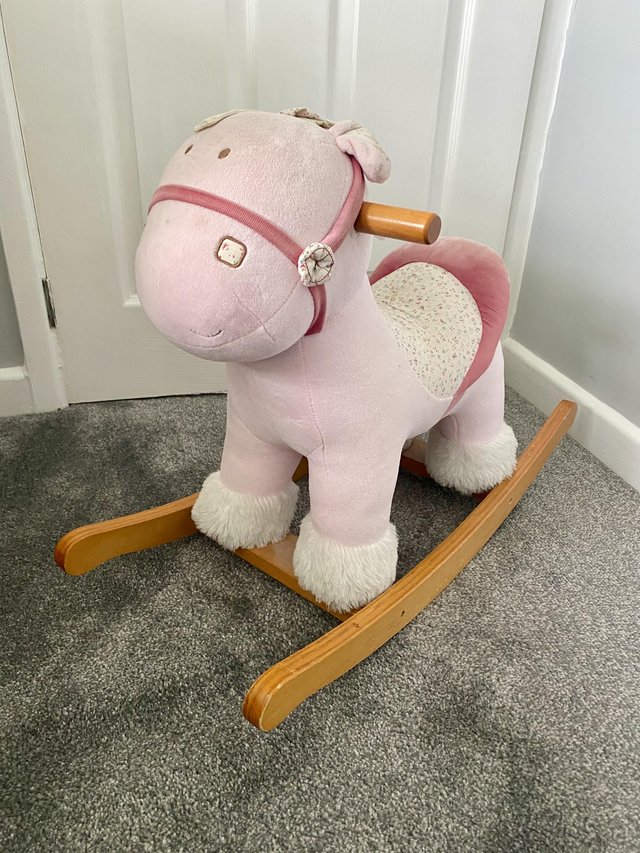 Preview of the first image of Child’s Mama&Papas rocking horse,Fisher Price activity chair.