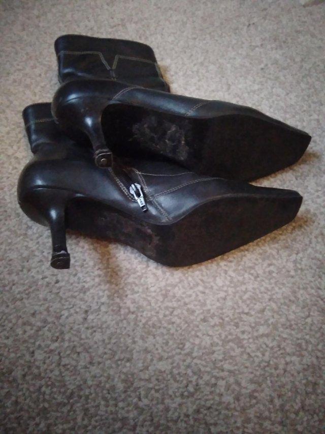 Preview of the first image of Leather high heel boots size 39.