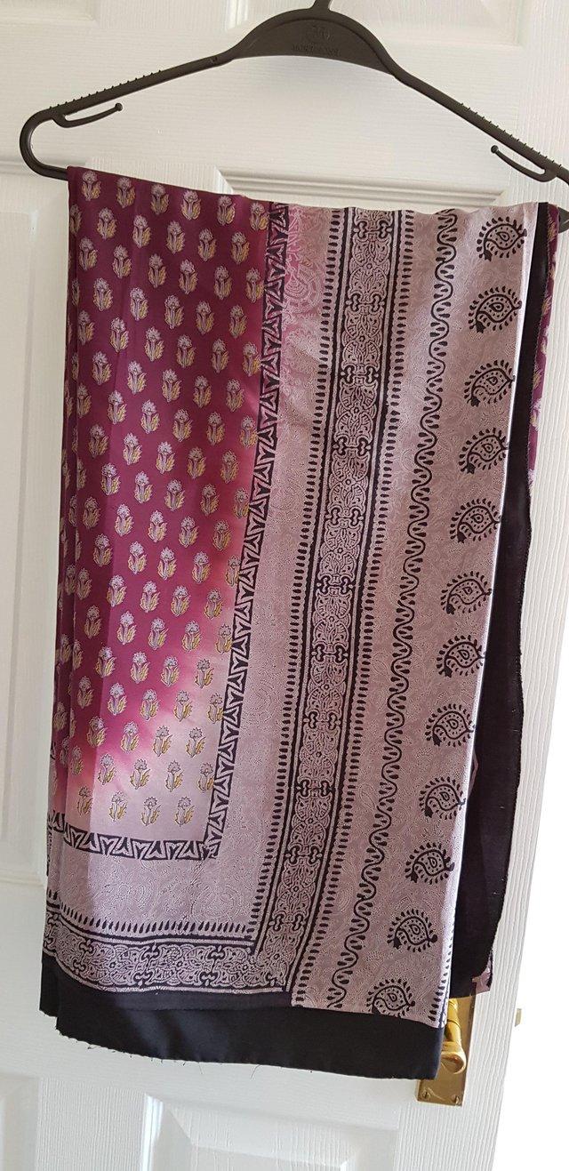 Preview of the first image of Pure crepe de chine printed saree.