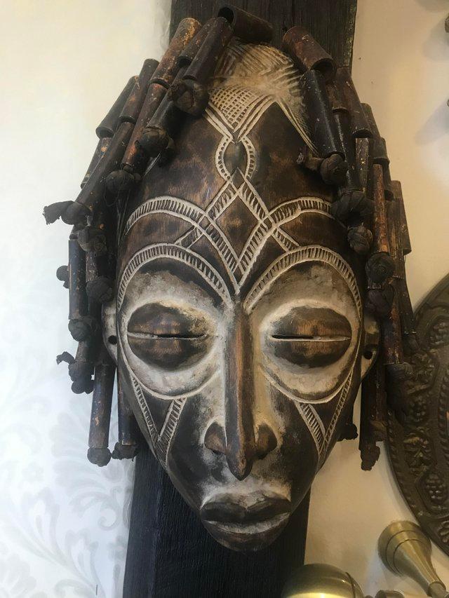 Preview of the first image of Vintage African carved wooden mask.